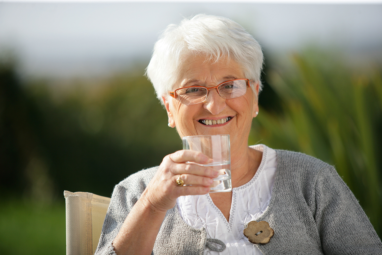 Senior woman with a glass of water