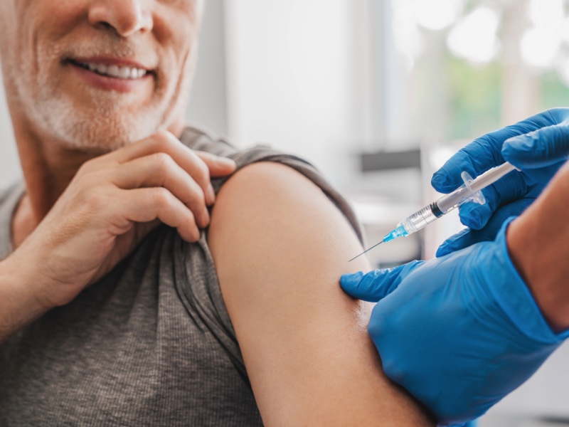 Senior getting an annual flu vaccine